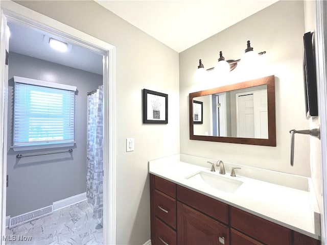 bathroom with visible vents, marble finish floor, vanity, and baseboards