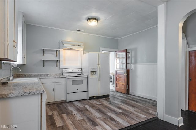 kitchen featuring white appliances, open shelves, dark wood-style flooring, a sink, and white cabinets