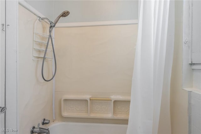 full bathroom with shower / bathtub combination with curtain