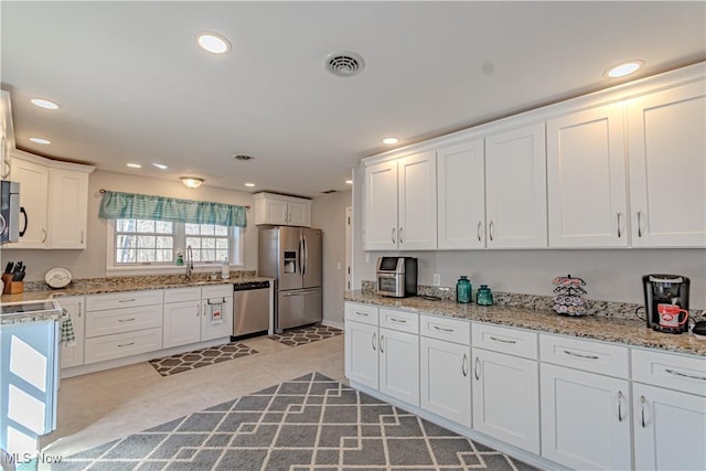 3164 Old Weymouth Rd, Medina, OH 44256 - kitchen with white cabinetry, a sink, stainless steel appliances, and visible vents