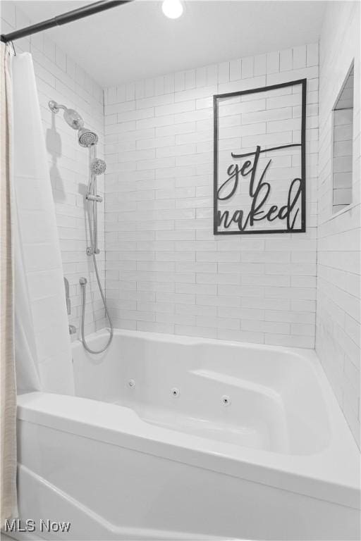 bathroom featuring a combined bath / shower with jetted tub