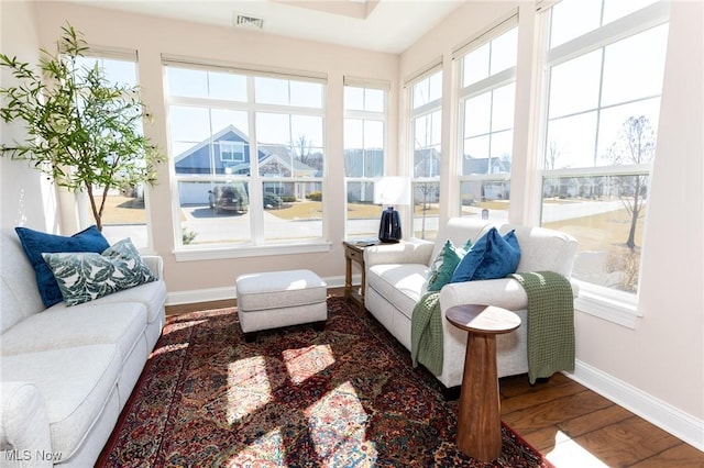 sunroom featuring visible vents