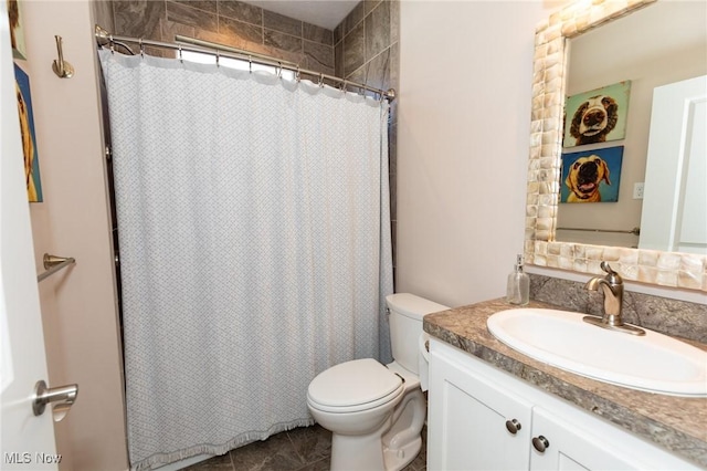 bathroom with a shower with shower curtain, toilet, and vanity