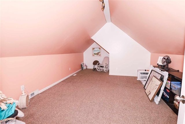 playroom with carpet flooring, baseboards, and lofted ceiling