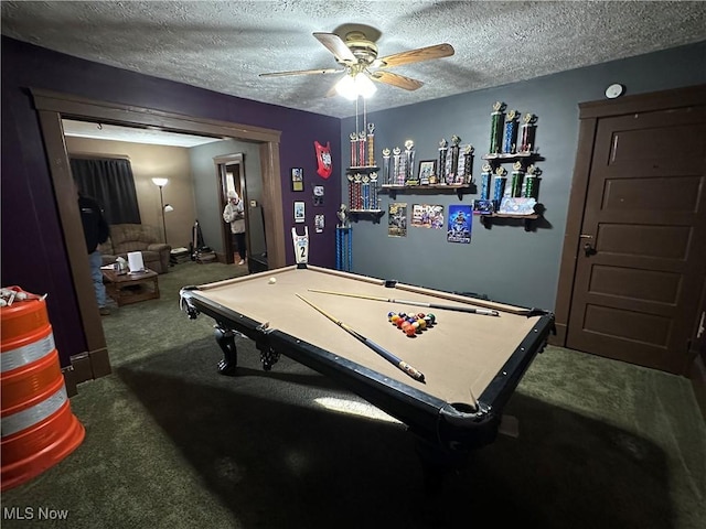 recreation room with a textured ceiling, billiards, ceiling fan, and carpet floors