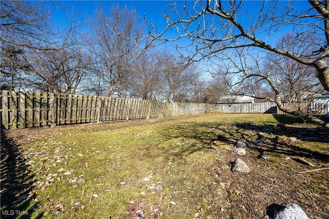 view of yard featuring a fenced backyard