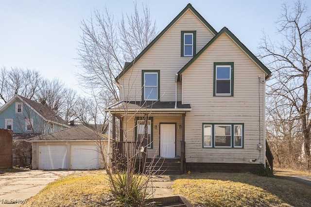 view of front of home featuring covered porch, concrete driveway, and an attached garage