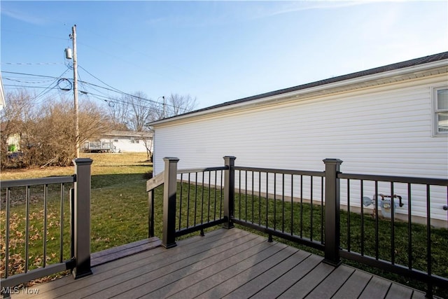 deck featuring a lawn