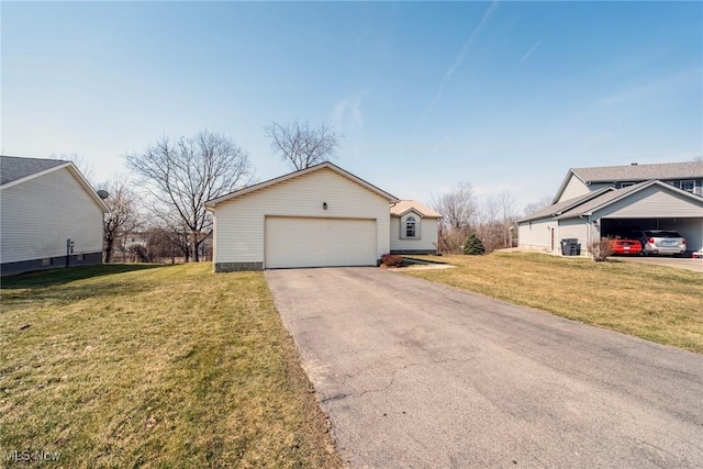 view of front of home featuring a garage and a front yard