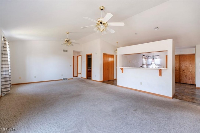 unfurnished living room featuring baseboards, carpet, visible vents, and ceiling fan