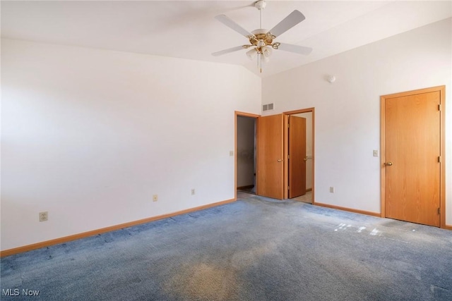 spare room featuring a ceiling fan, baseboards, visible vents, and light carpet