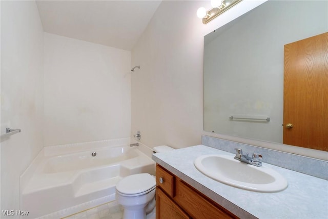 bathroom with vanity, toilet, and a bathtub