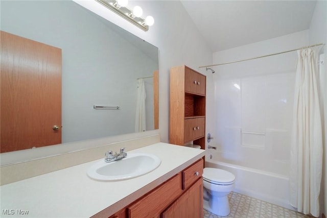 full bathroom featuring vanity, tile patterned floors, toilet, and shower / bathtub combination with curtain