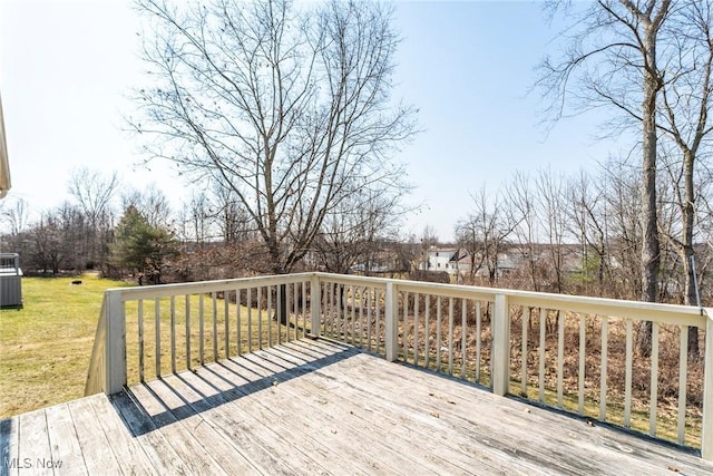 deck featuring a lawn