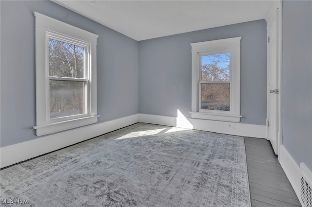 spare room featuring a wealth of natural light