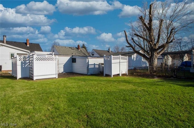 view of yard featuring fence