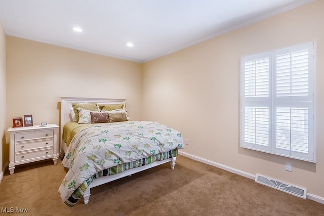 bedroom featuring baseboards, visible vents, carpet floors, recessed lighting, and crown molding