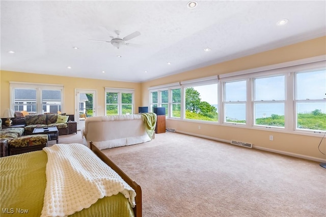 carpeted bedroom with recessed lighting, baseboards, and visible vents