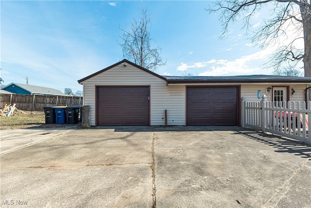 garage featuring fence