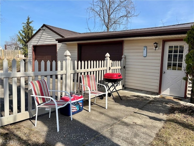 view of patio / terrace with fence