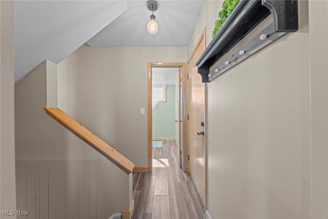 hallway with light wood finished floors