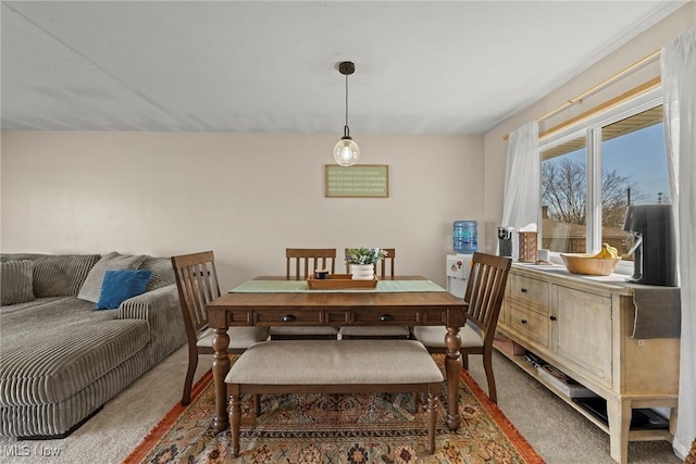 dining area featuring carpet floors