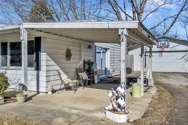 view of patio with an outbuilding