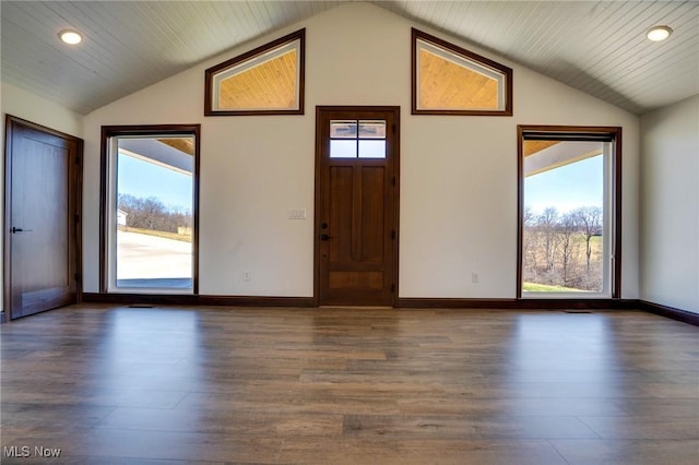 entrance foyer with dark wood finished floors, recessed lighting, baseboards, and lofted ceiling