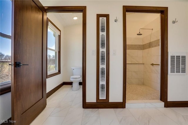 full bathroom featuring visible vents, a healthy amount of sunlight, and a walk in shower