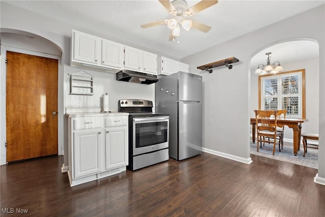 kitchen featuring under cabinet range hood, light countertops, appliances with stainless steel finishes, white cabinetry, and dark wood-style flooring