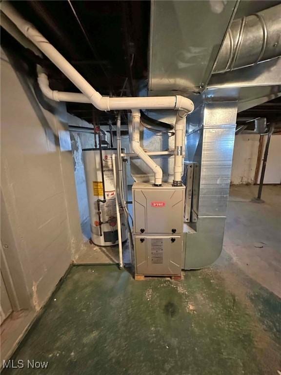 utility room featuring gas water heater