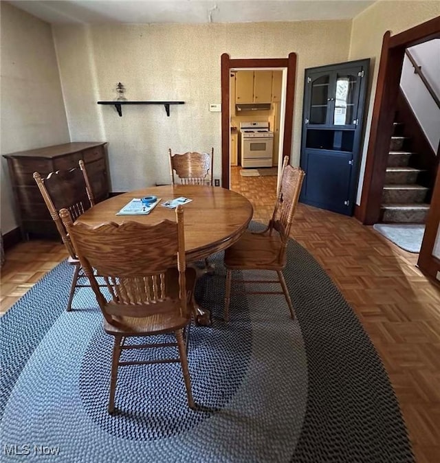 dining space with stairs