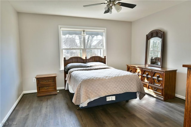 bedroom with a ceiling fan, dark wood-style floors, and baseboards