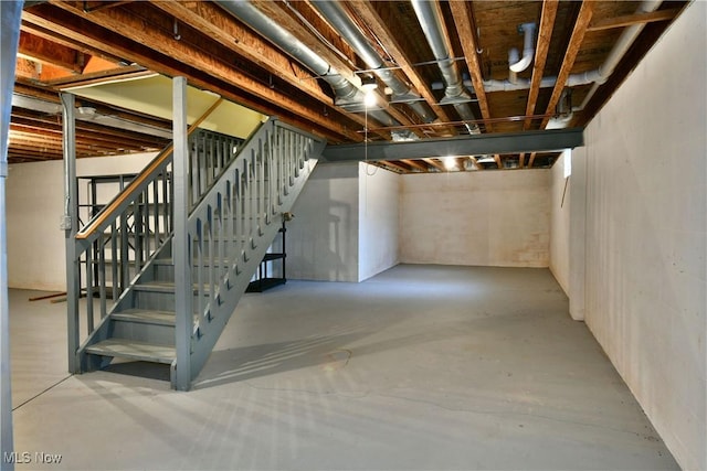 unfinished basement with stairway