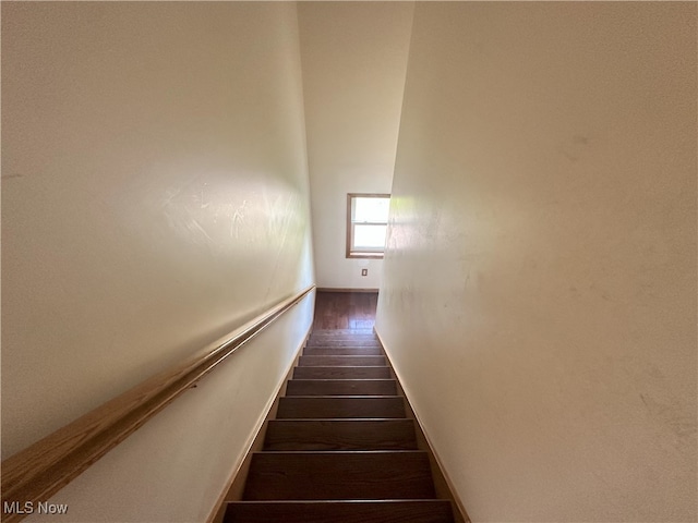 17583 Davis Ridge Rd, Caldwell, OH 43724 - staircase featuring wood finished floors and baseboards
