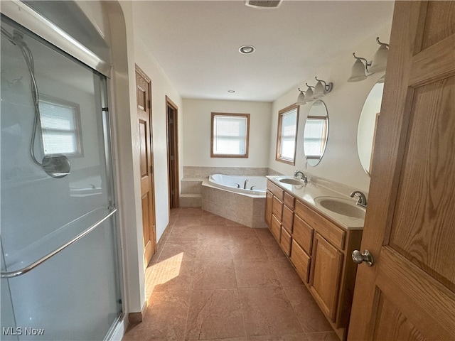 17583 Davis Ridge Rd, Caldwell, OH 43724 - full bathroom with a stall shower, a bath, double vanity, and tile patterned flooring