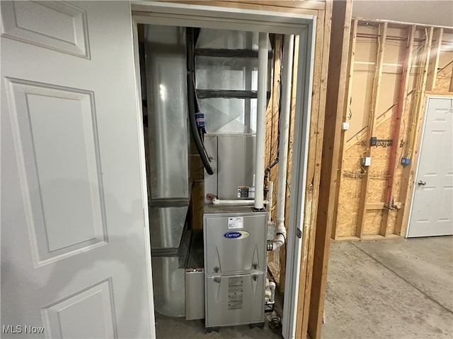 17583 Davis Ridge Rd, Caldwell, OH 43724 - utility room with heating unit