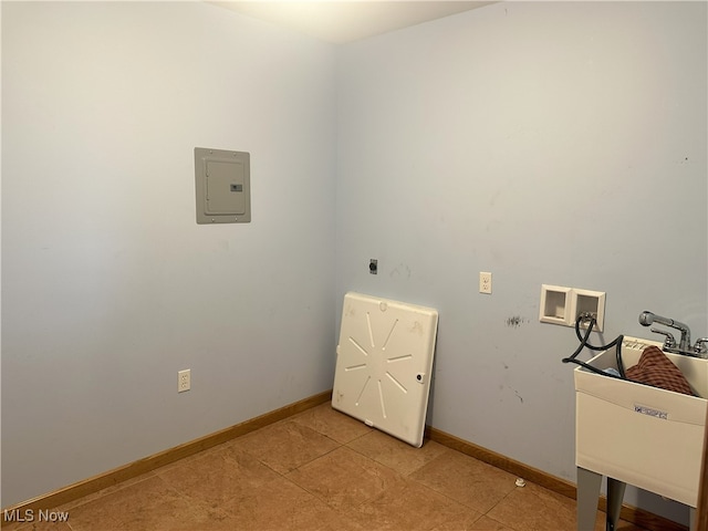 17583 Davis Ridge Rd, Caldwell, OH 43724 - laundry area featuring washer hookup, light tile patterned floors, baseboards, electric panel, and hookup for an electric dryer