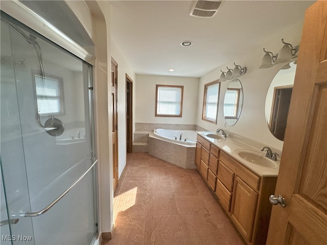 17583 Davis Ridge Rd, Caldwell, OH 43724 - full bath with a shower stall, a bath, double vanity, and recessed lighting