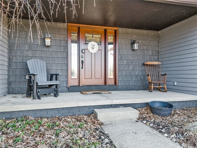 doorway to property with a porch