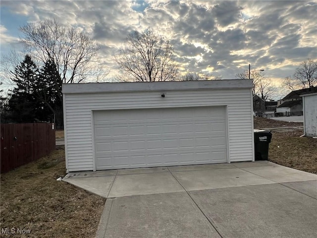 detached garage with fence