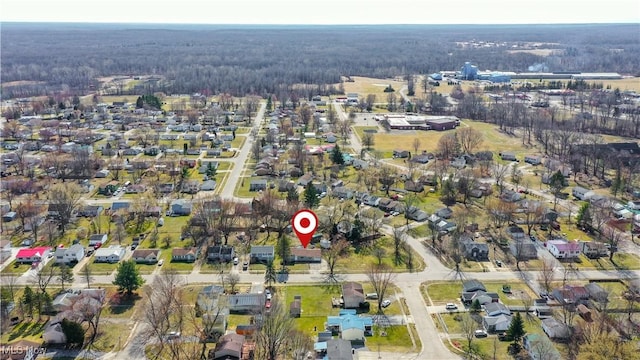 bird's eye view featuring a residential view and a view of trees