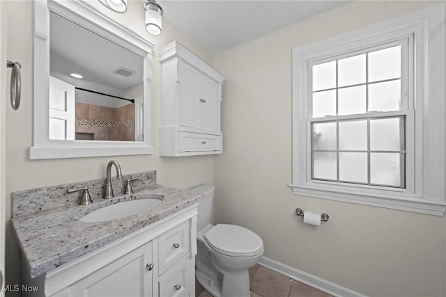 full bath featuring tile patterned floors, visible vents, toilet, baseboards, and vanity