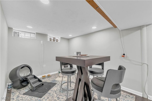 dining area featuring recessed lighting, wood finished floors, and baseboards