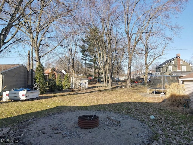 view of yard with a trampoline