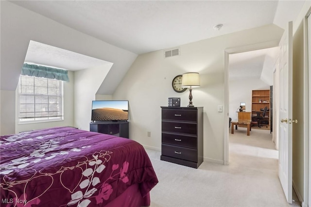 bedroom featuring visible vents, lofted ceiling, baseboards, and carpet flooring