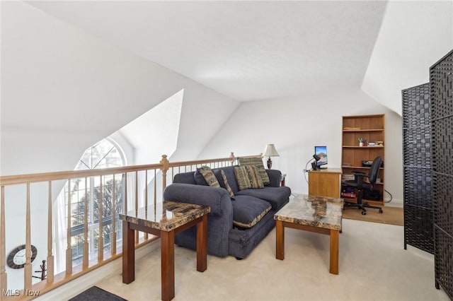 living area with light carpet and vaulted ceiling