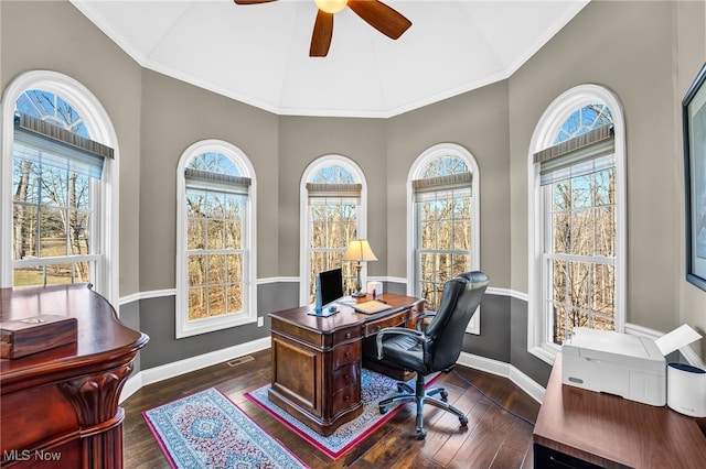 office featuring dark wood-type flooring, crown molding, baseboards, and vaulted ceiling