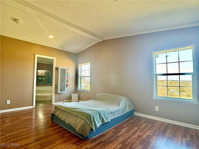 bedroom featuring ornamental molding, baseboards, and wood finished floors