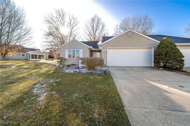 ranch-style house with an attached garage, concrete driveway, a front lawn, and roof with shingles